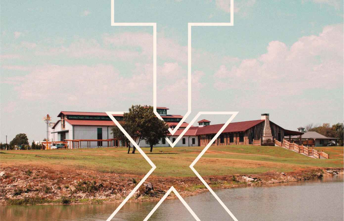 Wide shot of TX Whiskey Ranch with a TX logo overlay.
