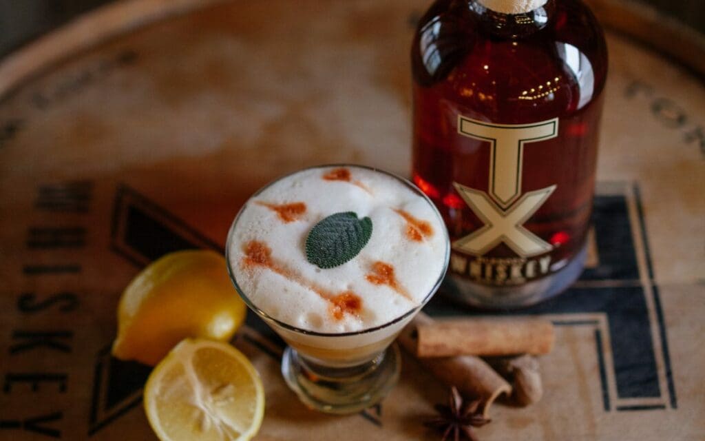 Winter Whiskey Sour cocktail made with TX Blended Whiskey
