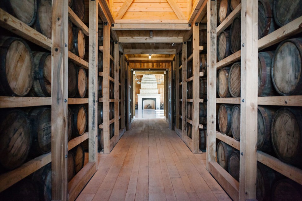 The ranch house with barrels on walls