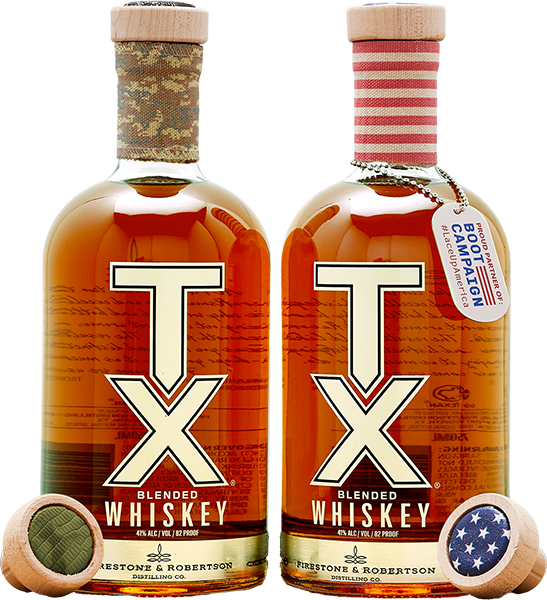 Two bottles of TX Whiskey sitting with special caps
